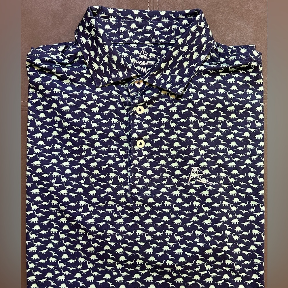Rhoback Men’s Short Sleeve Performance Polo The Dino Navy/Teal Size Medium GUC